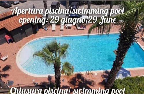 Fondachello Apartment | Oceanfront Escape at Sicilia: Rated 9.5 with Pool Access