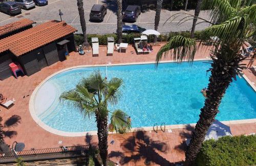 Fondachello Apartment | Oceanfront Escape at Sicilia: Rated 9.5 with Pool Access