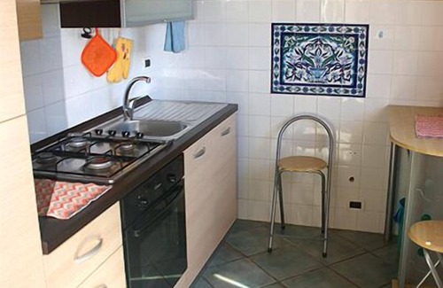 Isola Villa | Experience Villa Gialla: Poolside Bliss Near Sandy Shores