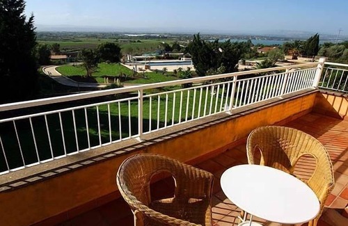 Isola Villa | Experience Villa Gialla: Poolside Bliss Near Sandy Shores