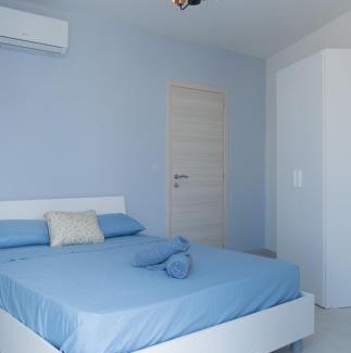 Bahar ic-Caghaq Apartment | Inviting Side-Seaview Apartment Steps from the Beach