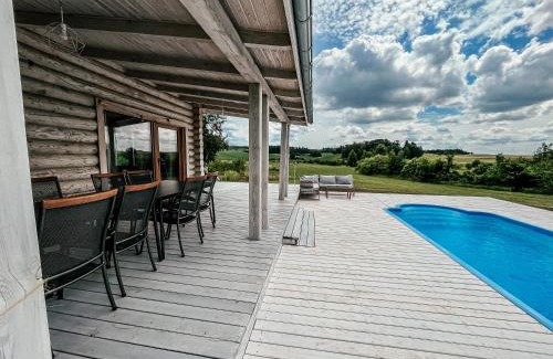 Miłki House | Idyllic Poolside Retreat in Rydzewie with Ocean Views