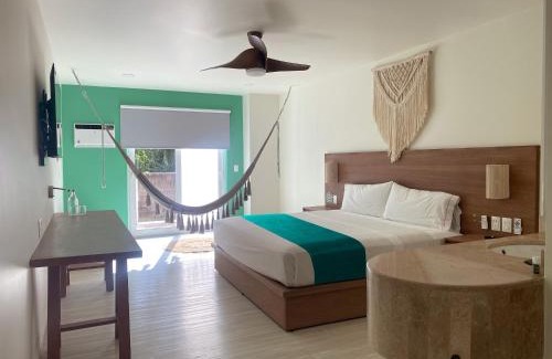 Ek Balam Village Hotel | Discover Siente Tulum: Family-Friendly Oasis with Pool