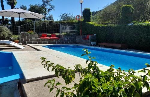 Villa Carlos Paz House | Relax at Sierras Del Sol with Oceanfront Views and Pool