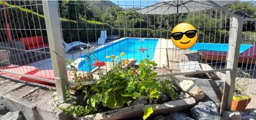 Villa Carlos Paz House | Relax at Sierras Del Sol with Oceanfront Views and Pool