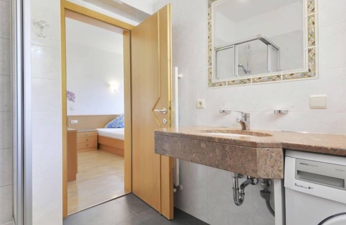 Andriano Apartment | Unforgettable Sigmundskron: Pool, Lake Views & Spa Retreat