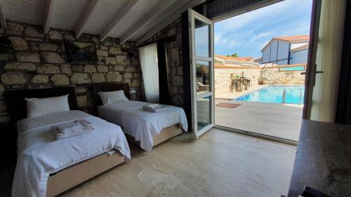 Hacımemis Hotel | Signature Alaçatı: Oceanfront Oasis with Pet-Friendly Perks