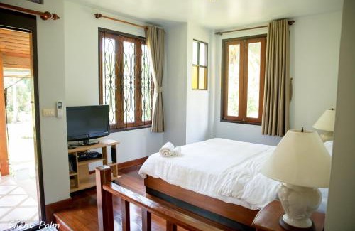 Thong Krut Villa | Discover Silent Palm Samui: Oceanfront Gem with Pool