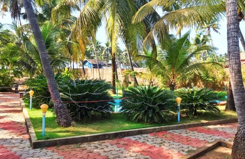 Malpe Villa | Experience Silver Sands: Family and Pet-Friendly Retreat
