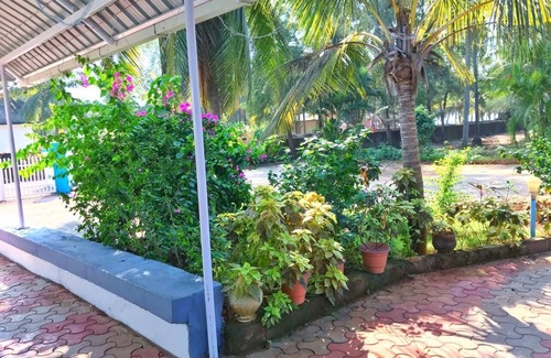 Malpe Villa | Experience Silver Sands: Family and Pet-Friendly Retreat