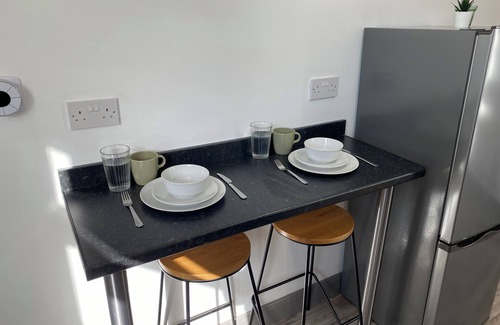 Church Gresley House | Discover Silver Stag Properties: Ensuite Bedrooms & Kitchen
