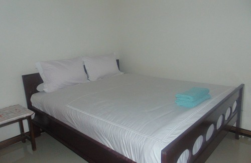 Moni House | Cozy Sima Homestay: Family-Friendly with Breakfast Included