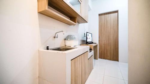Surabaya Apartment | Cozy 1BR Retreat at The City Square Apartment