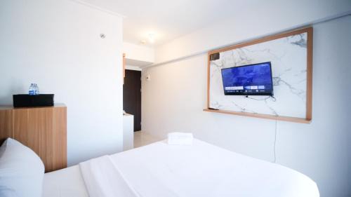 Sidoarjo Apartment | Cozy Studio Apartment at Suncity Residence By Travelio