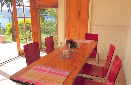 Dennes Point Cottage | Simple cottage with charm, character and exceptional views