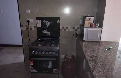 Ras Makamaiwe Apartment | Inviting Ocean View at C52: Pool and Pet-Friendly Retreat