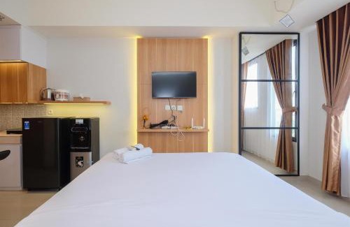 Pondokcina Apartment | Stylish Design Studio Room at Evenciio Margonda Apartment