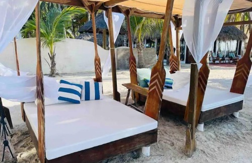 Santa Clara House | Discover Paradise: 8BR Home with Pool & Volleyball Court