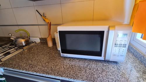 Ezeiza Apartment | Top-Rated Simpsoniano Central Apartment for Your Stay