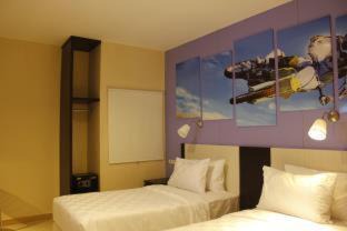 Bengkulu Hotel | Discover Sinar Sport Hotel: Family-Friendly with Pool & Dining