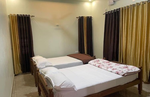 Kalady House | Guest Rated Holiday Home: Family-Friendly Sindhooram Escape