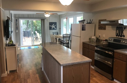 Roach House | Tranquil Lakeside Retreat with Child-Friendly Amenities
