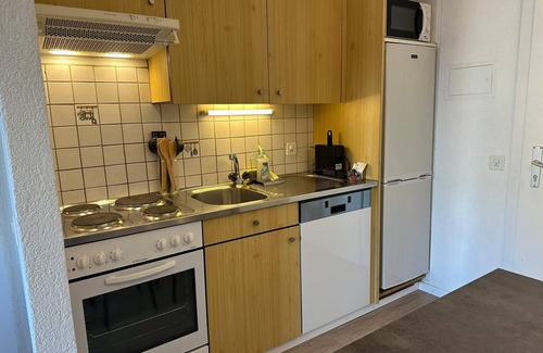 Sion Apartment | Convenient Stay at Sion Central Station with Family Amenities