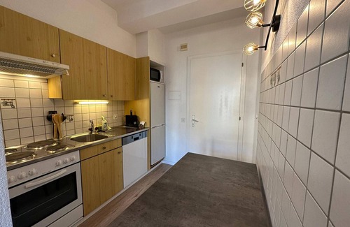 Sion Apartment | Convenient Stay at Sion Central Station with Family Amenities