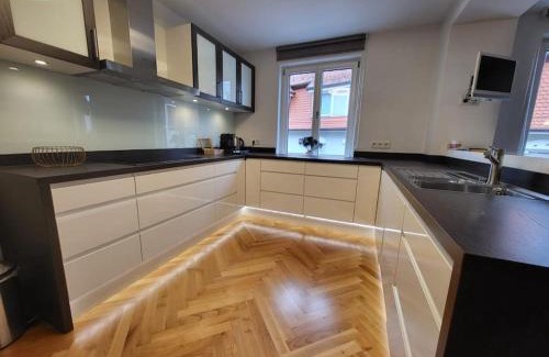 Kempten Apartment | SiOUX: Elegant Penthouse with Ocean Views in City Center