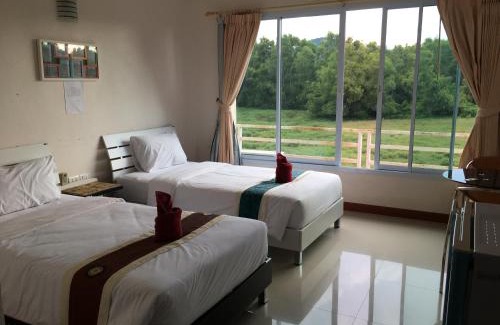Khanom Apartment | Welcoming Siriburi Resort: Family-Friendly Retreat Awaits