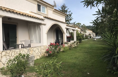 Almiros Beach House | Discover Sirios Villas: Ocean View & Kitchen Amenities