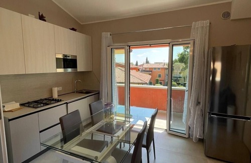 Colombare Apartment | Discover Sirmione FOREVER: Oceanfront Retreat with Pool