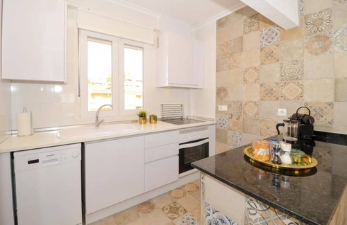 Punta Prima Apartment | Sit back and relax in a stylish space just a few steps from the beach! n