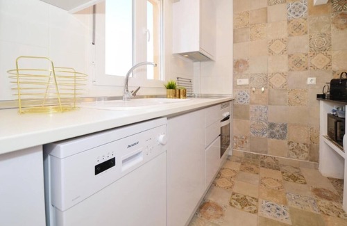 Punta Prima Apartment | Sit back and relax in a stylish space just a few steps from the beach! n