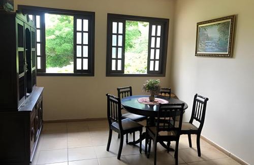 Jaboticatubas House | Inviting Retreat with Heated Pool and Family-Friendly Suites