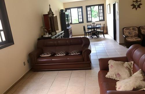 Jaboticatubas House | Inviting Retreat with Heated Pool and Family-Friendly Suites