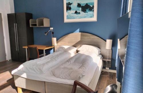 Kristiansand Hotel | Comfortable Stay at Sjøgløtt Gjestgiveri with Family Amenities