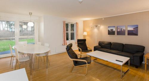 Mandal Apartment | Oceanfront Retreat at Sjøsanden Ferietun for Families