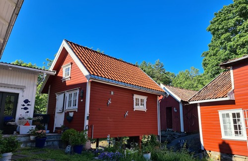 Jomfruland Cabin | Charming Stabbur in the Heart of Kragerø Skjærgård