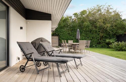 Hvidbjerg Strand House | Delightful Spa Retreat with Hot Tub & Family-Friendly Vibe