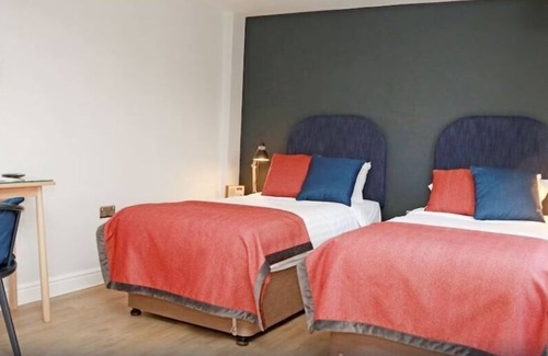 Henfield Hotel | Budget-Friendly SK George Hotel with Family Amenities
