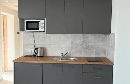 Anyksciai Apartment | Pet-Friendly Haven at SKA Anykščiai - Rated 9.9 by Guests