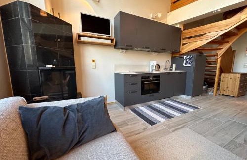 Pyhatunturi Apartment | Convenient Ski-in and Out Apartment in Pyhä - 4-Star Stay