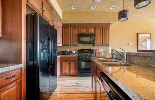 Champion House | Prime Location on Southwind Trail with Hot Tub & Spa Access