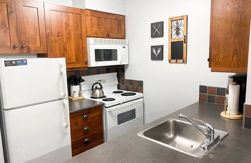 East Kootenay Condo | Prime Ski In/Out Condo with Pool & Lake View in Upper Village