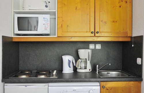 Valmeinier Apartment | Discover Valmeinier: Poolside Retreat Near Shops & Family Fun