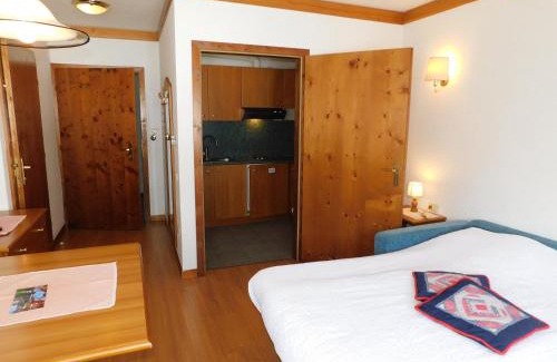 San Martino di Castrozza Apartment | Inviting Ski Residence with Hot Tub & Breakfast Options
