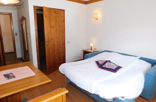 San Martino di Castrozza Apartment | Inviting Ski Residence with Hot Tub & Breakfast Options