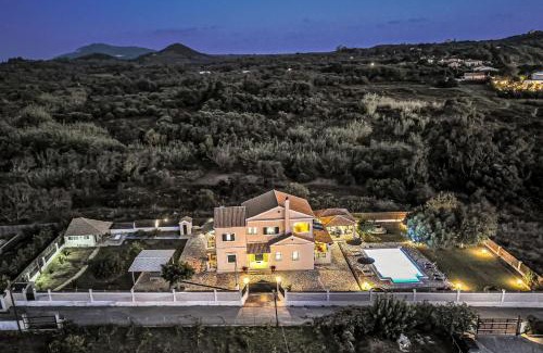 Agios Matthaios House | Stunning Skidi Beach House with Oceanfront Pool & Views