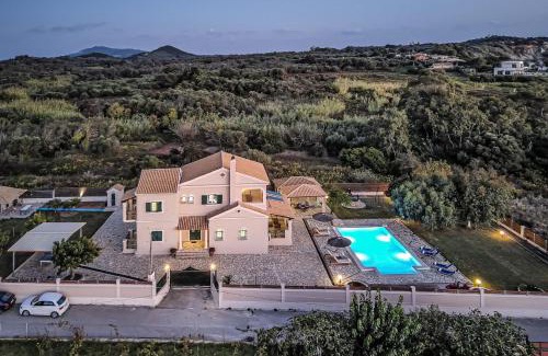 Agios Matthaios House | Stunning Skidi Beach House with Oceanfront Pool & Views